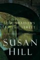 The shadows in the street Cover Image